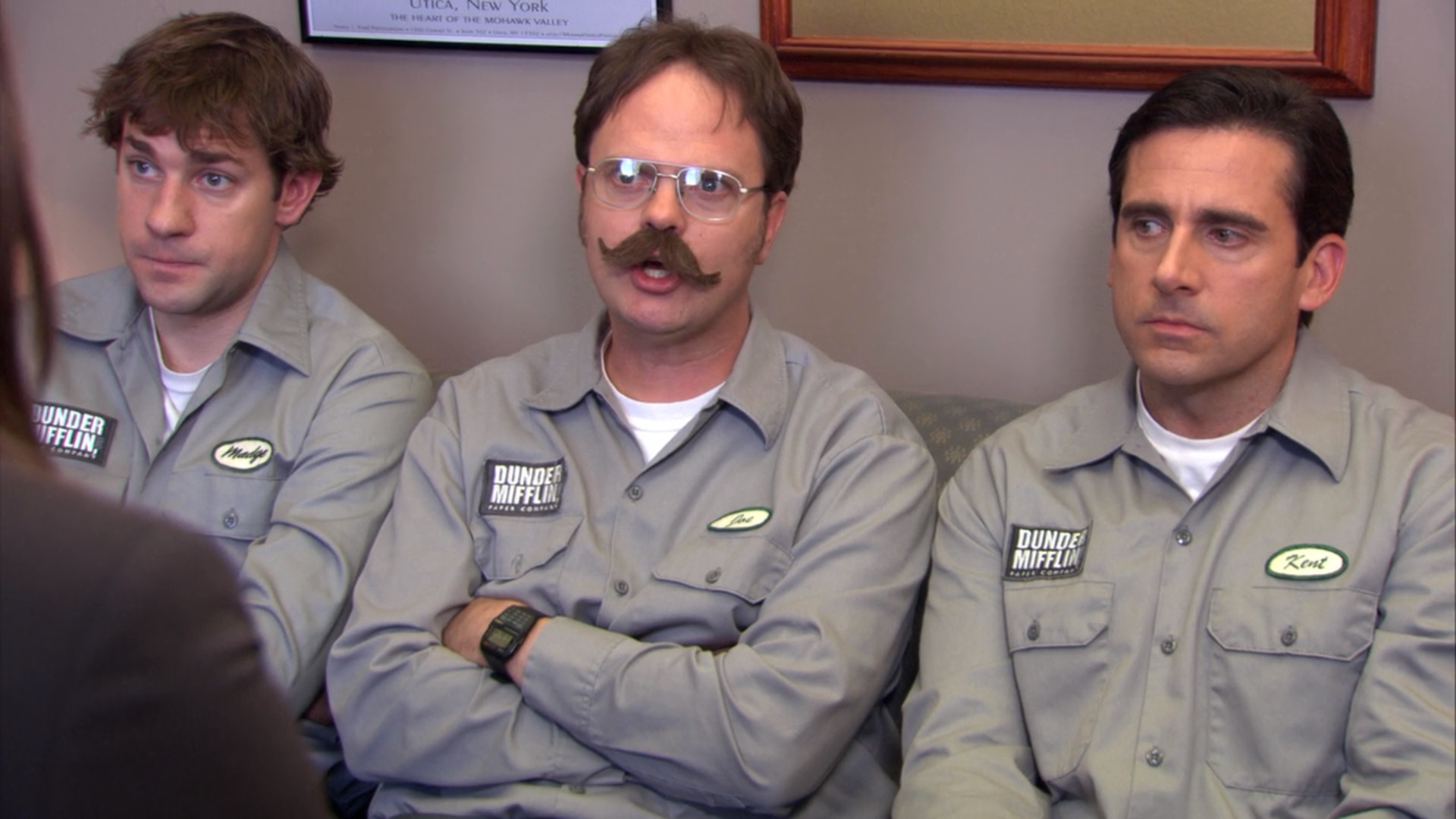Jim, Dwight, and Michael sitting in Karen's office.